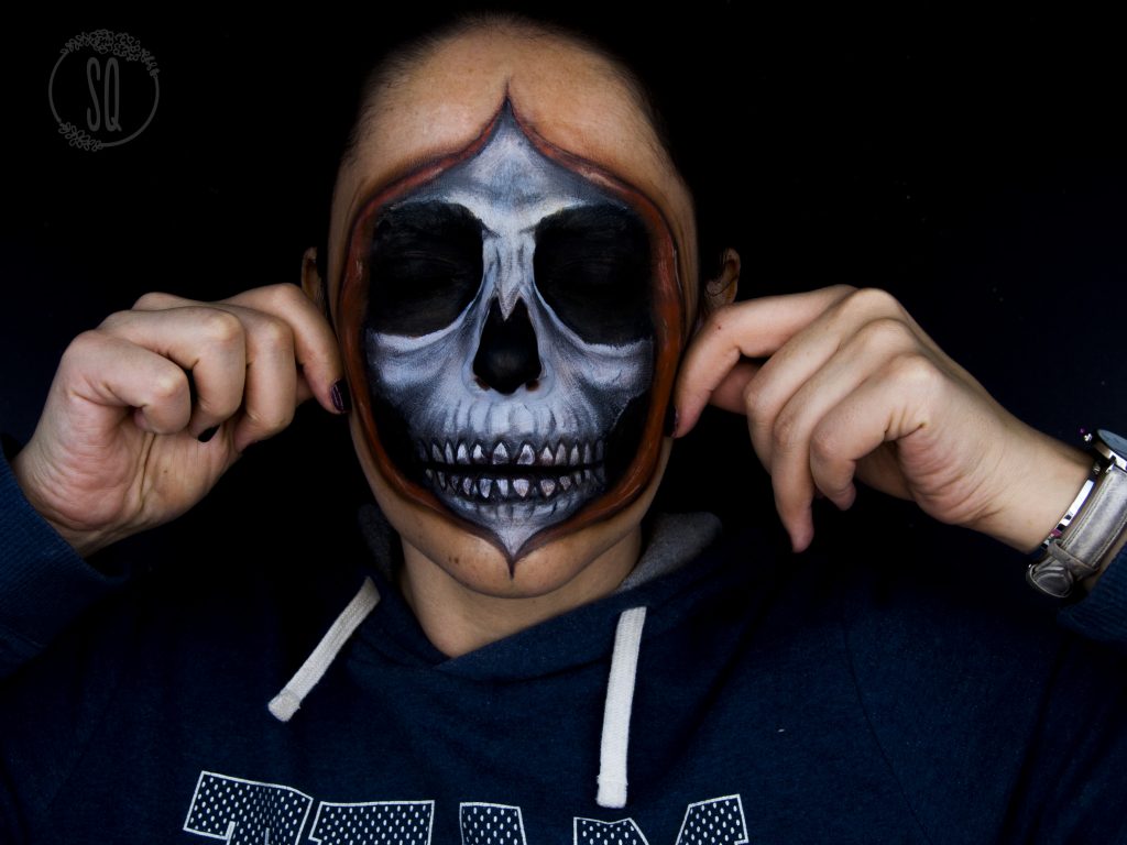 Face open effect showing the skull FX makeup